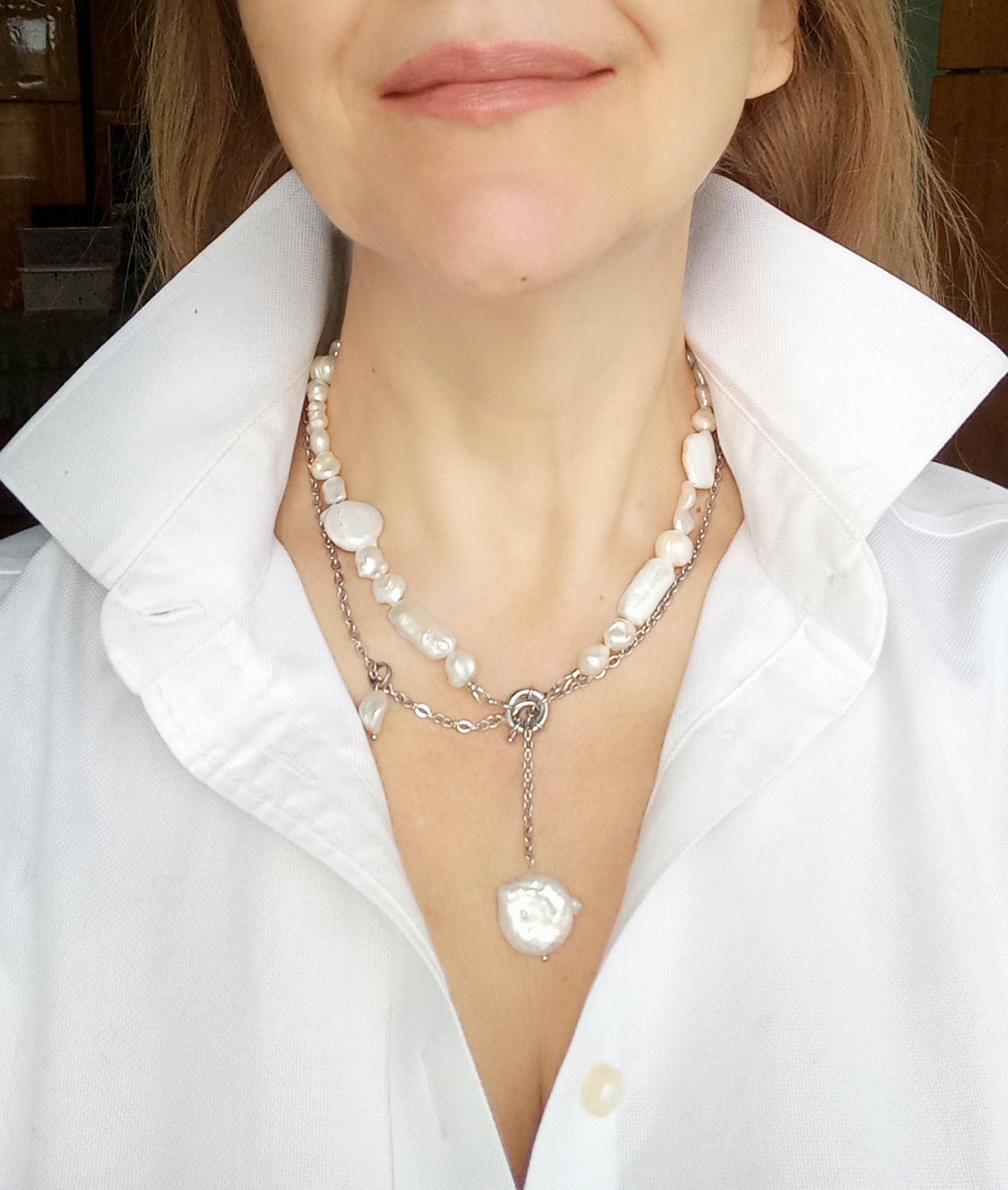 White pearl necklace with stainless steel chain detail