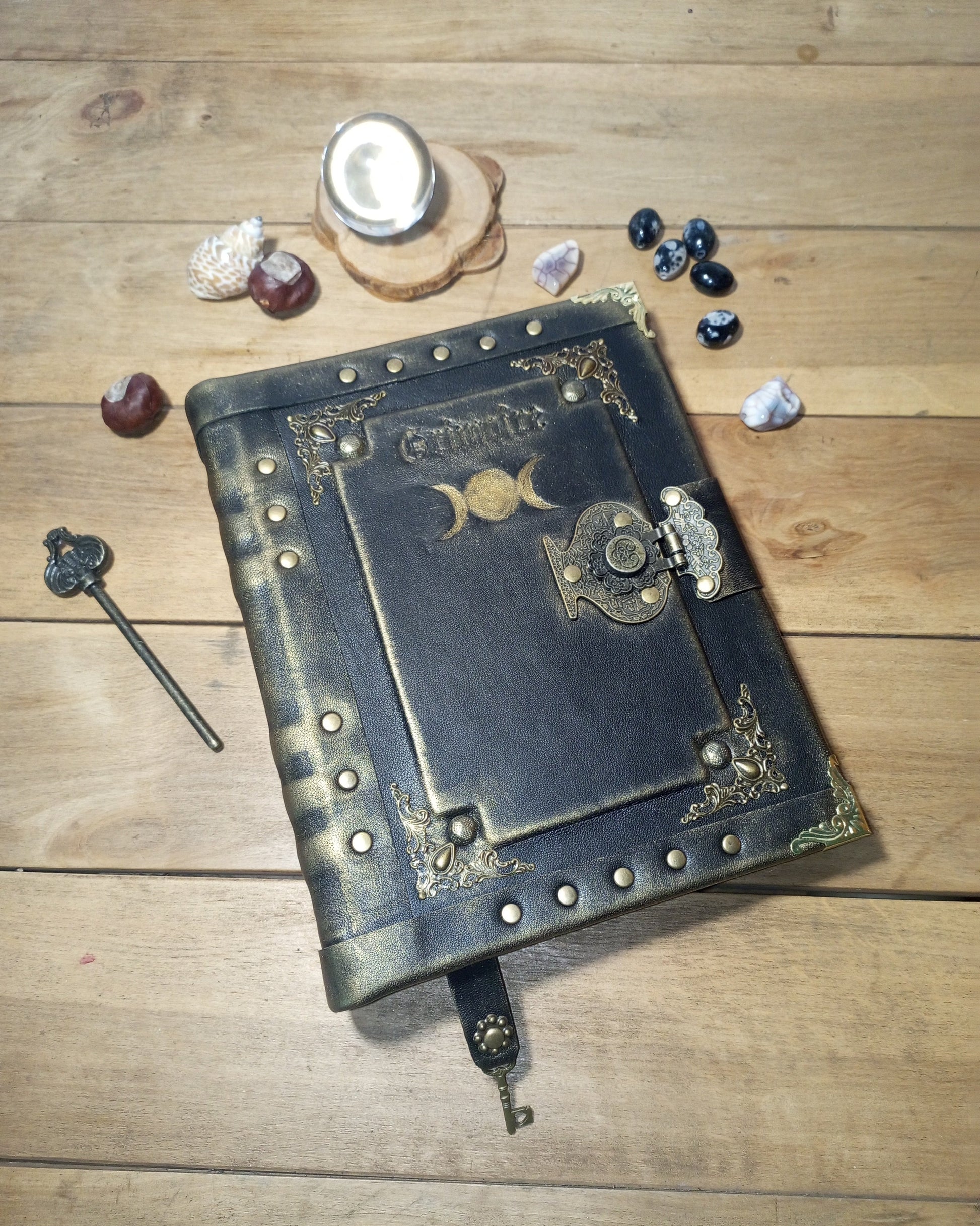 Black medieval leather grimoire with Triple Moon 