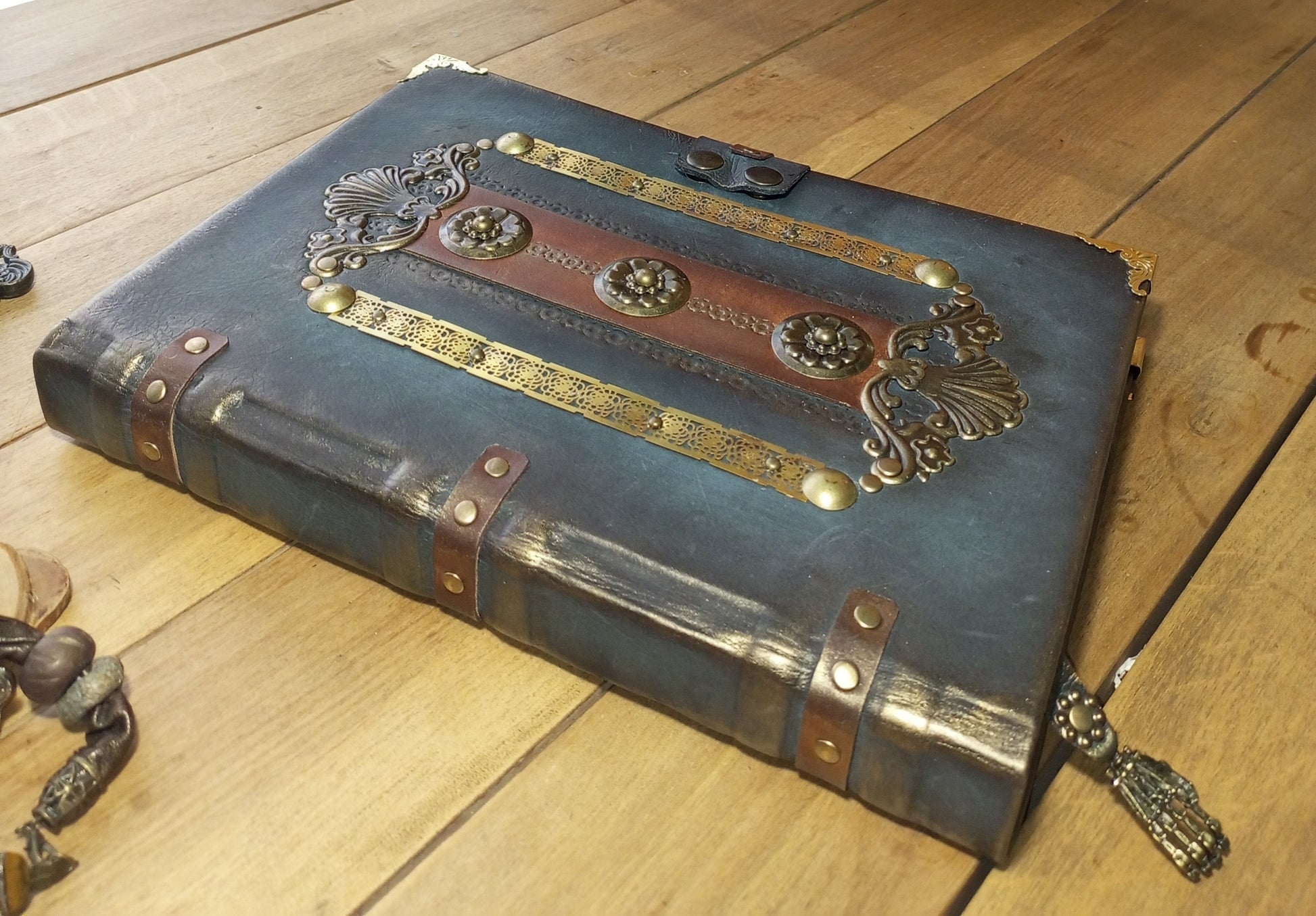 Brown grey leather journal with hand-stitched binding detail