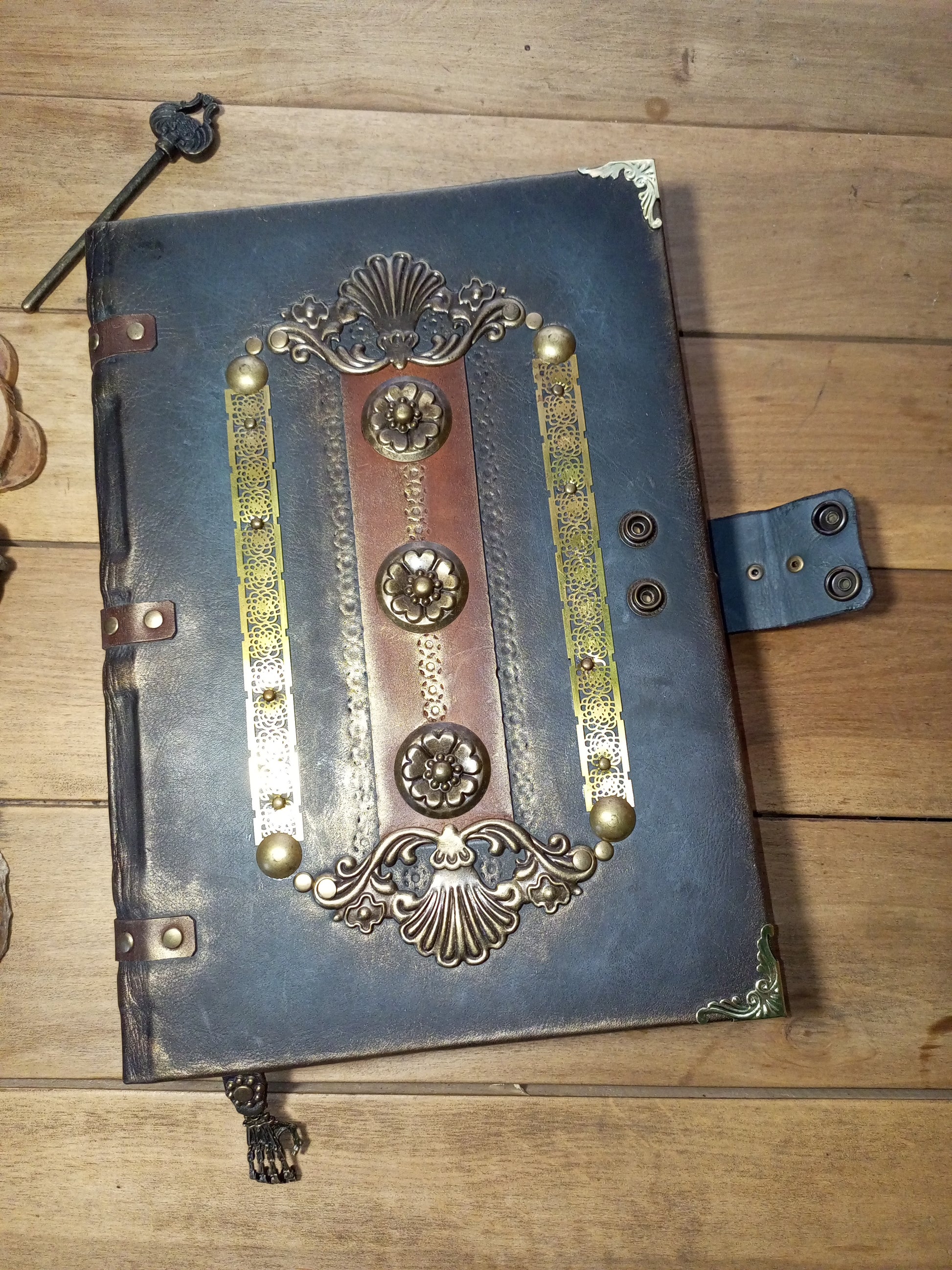 Antique style gray leather grimoire handmade close-up