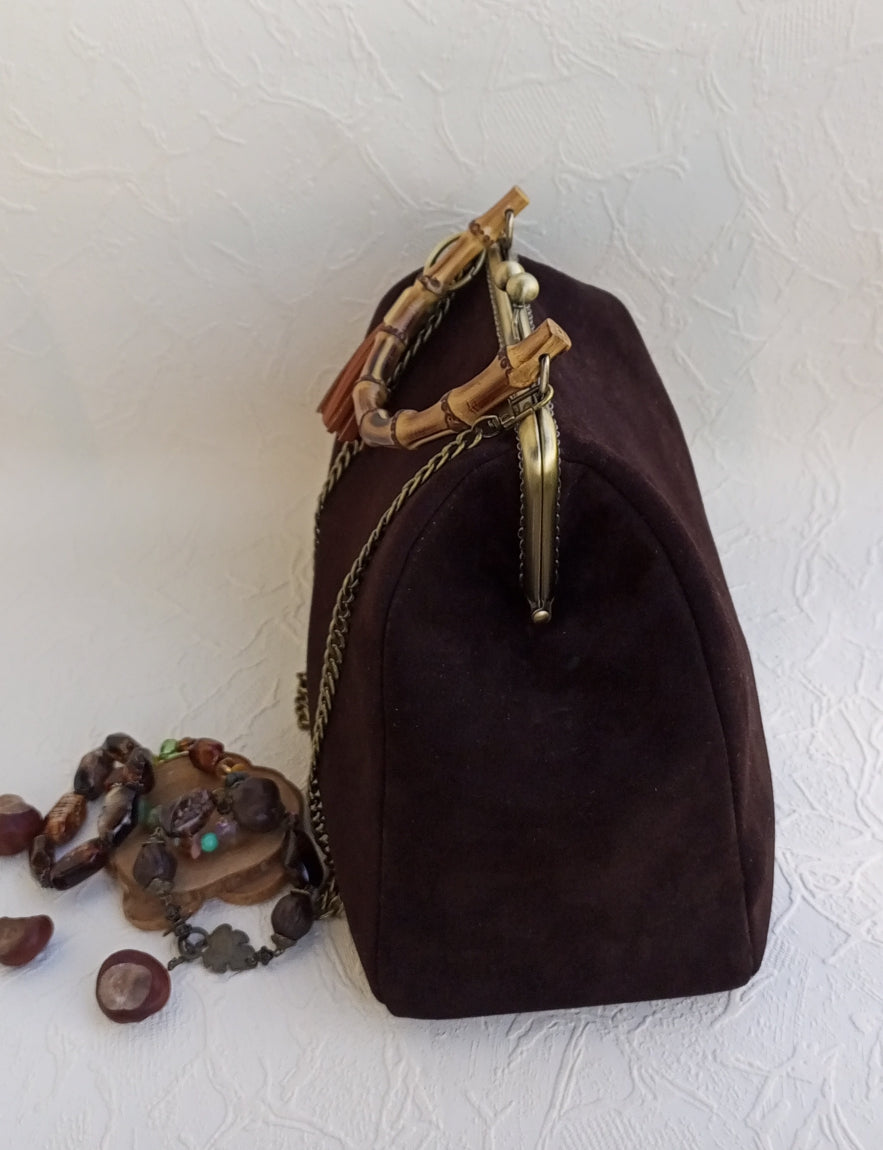 Vintage women suede shoulder bag with metal frame clasp