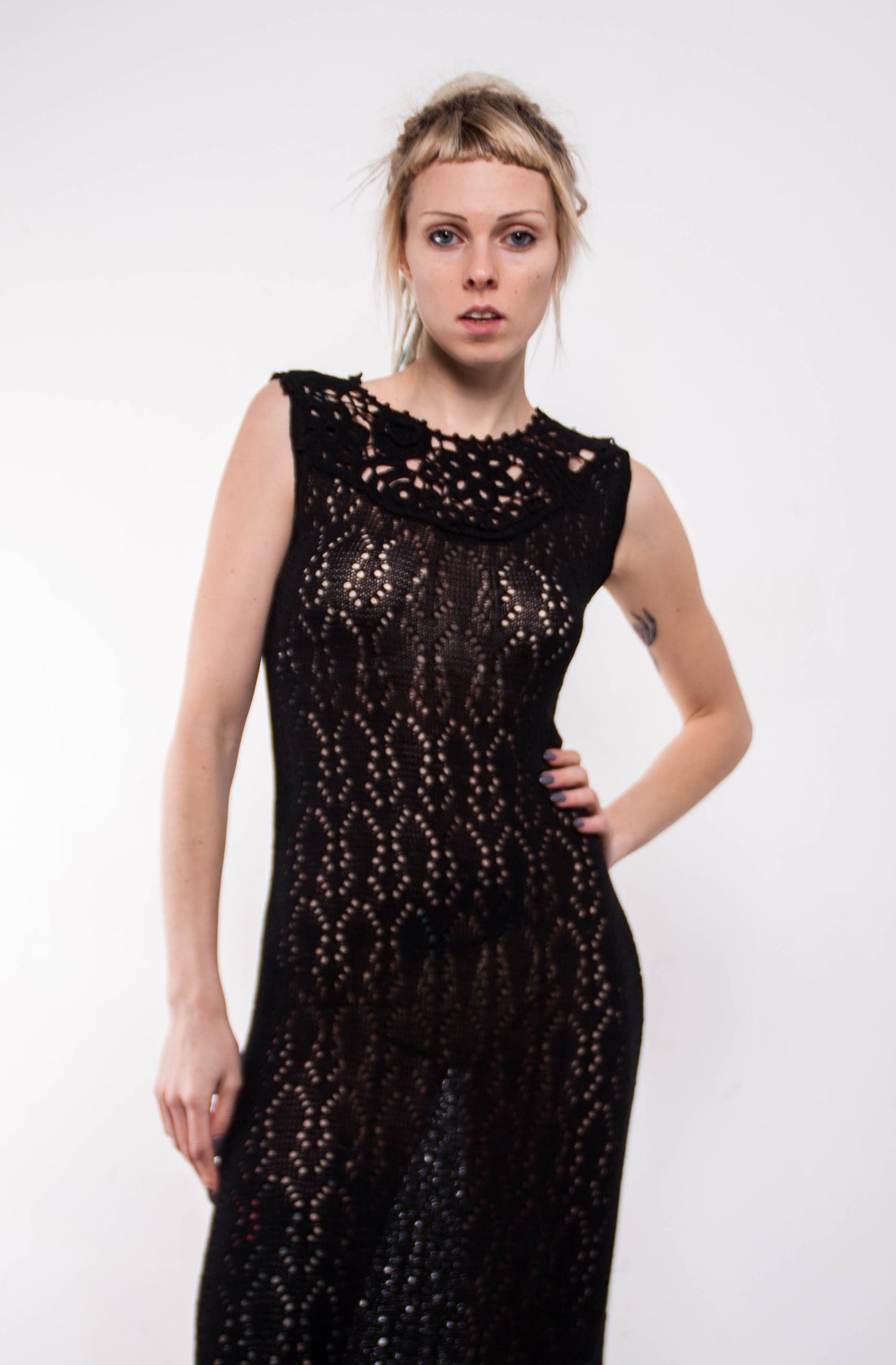 Close up crochet lace pattern black maxi dress