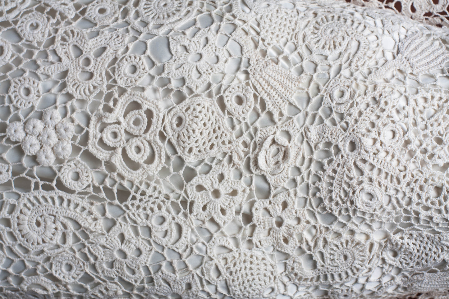 Crochet lace close up detail of handmade wedding gown