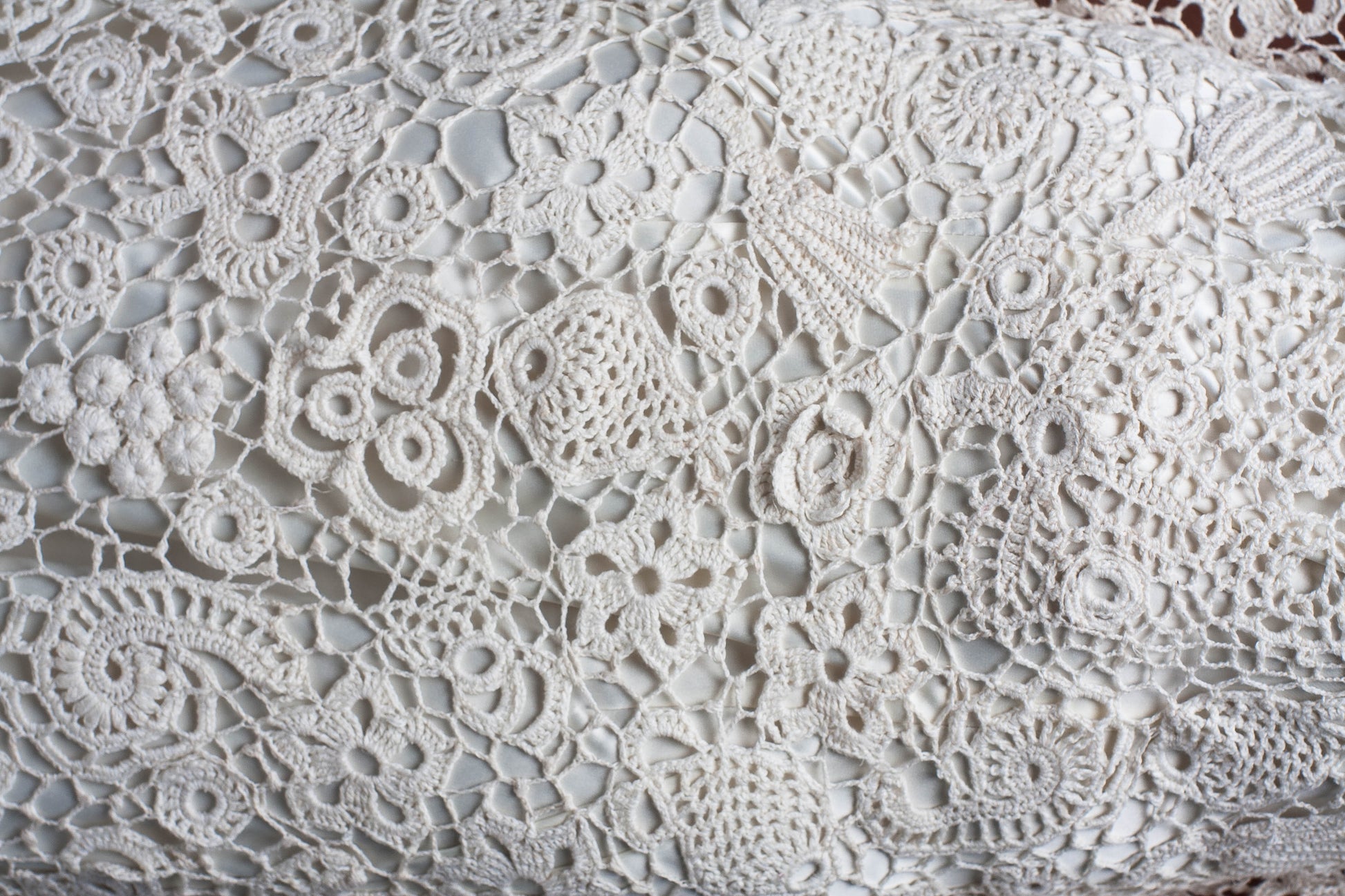 Crochet lace close up detail of handmade wedding gown