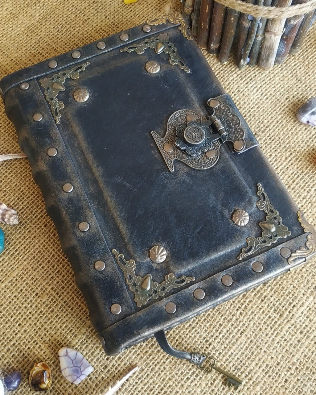 Black aged leather journal with antique lock nd rass embelishments