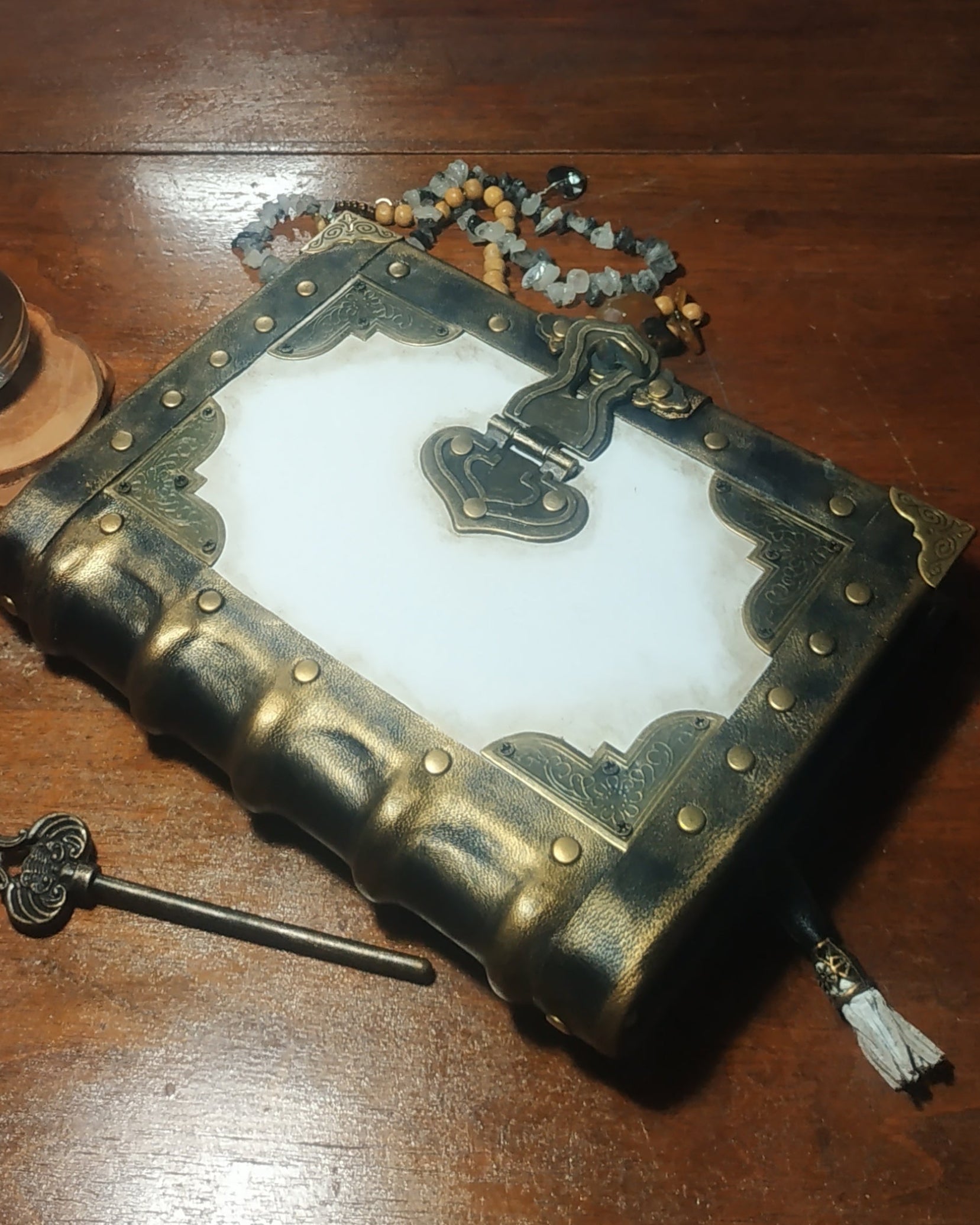 Black white aged leather journal o the vintage table