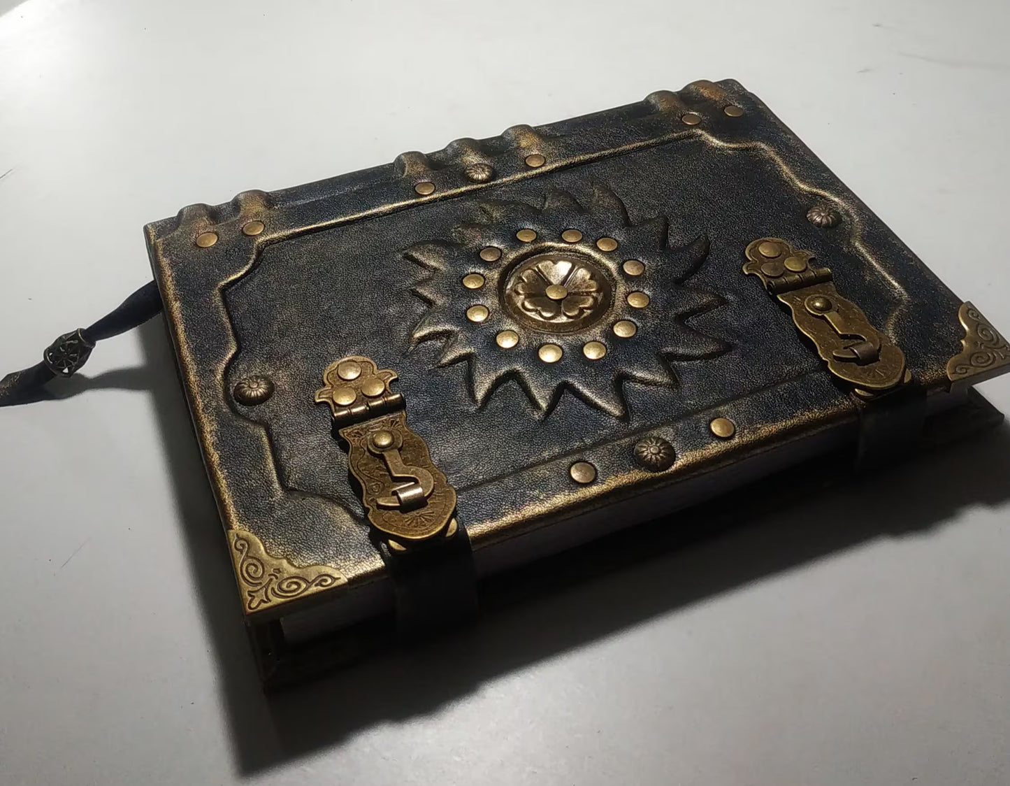 Black Leather Sun Grimoire with Antique Lock – Handmade Aged Journal, Vintage Book of Shadows