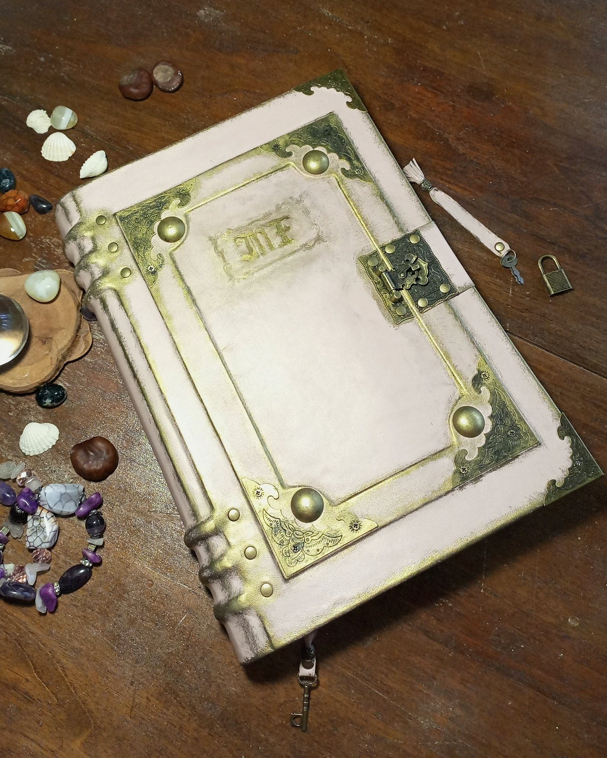 Pink aged leather personalized engraving journal with brass and antique lockembellishments 