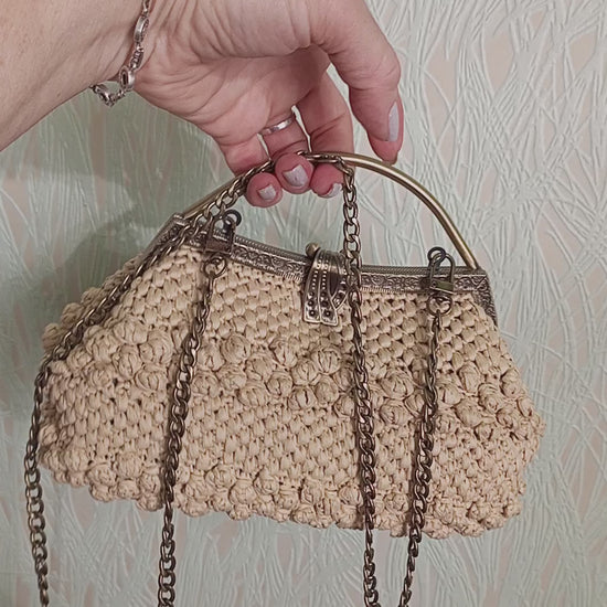 Video of beige crochet kisslock bag raffia wedding purse with gold clasp