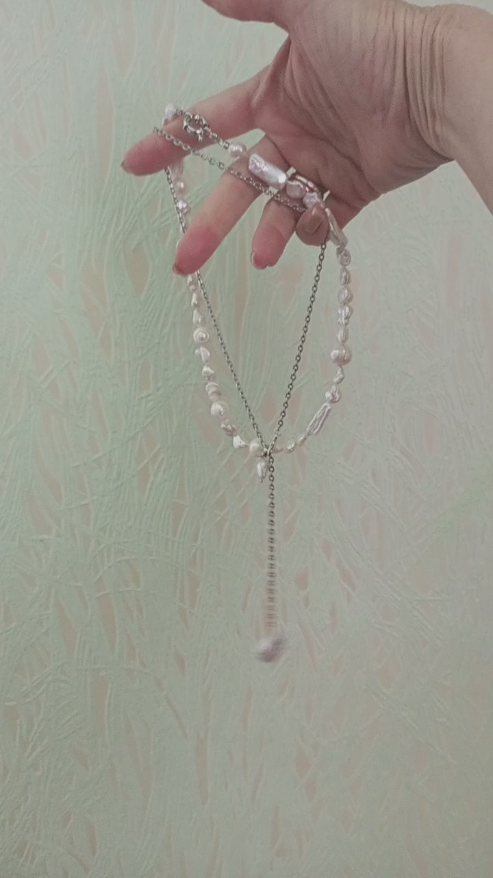Minimalist bridal pearl necklace with baroque pendant on video