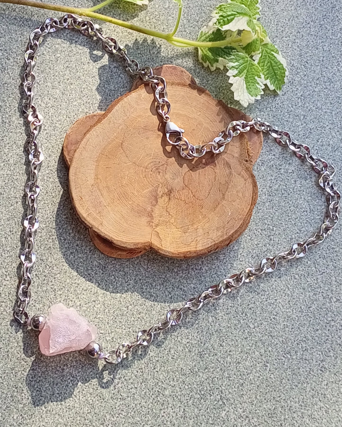 rose quartz necklace with raw pink gemstone nugget pendant and stainless steel chain