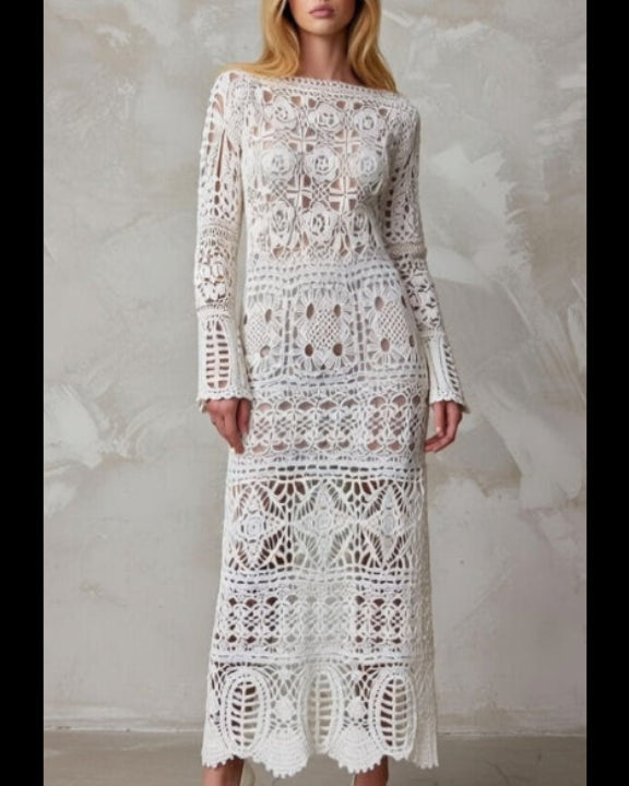 White crochet lacy maxi length wedding dress with long sleeves in boho style
