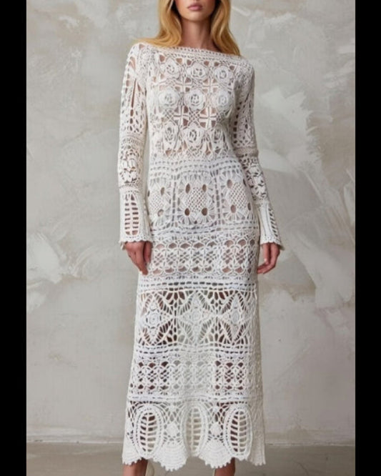 White crochet lacy maxi length wedding dress with long sleeves in boho style